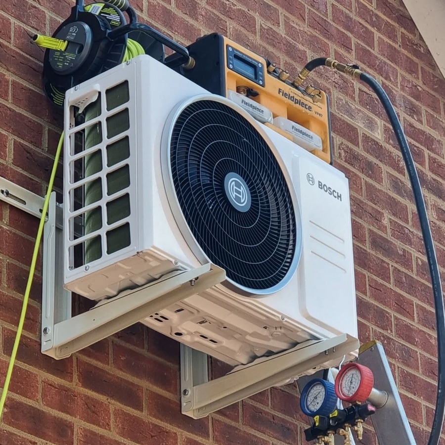 An air conditioner being serviced 